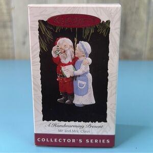 Hallmark Keepsake Ornament A Handwarming Present Mr. & Mrs. Claus Dated 1994